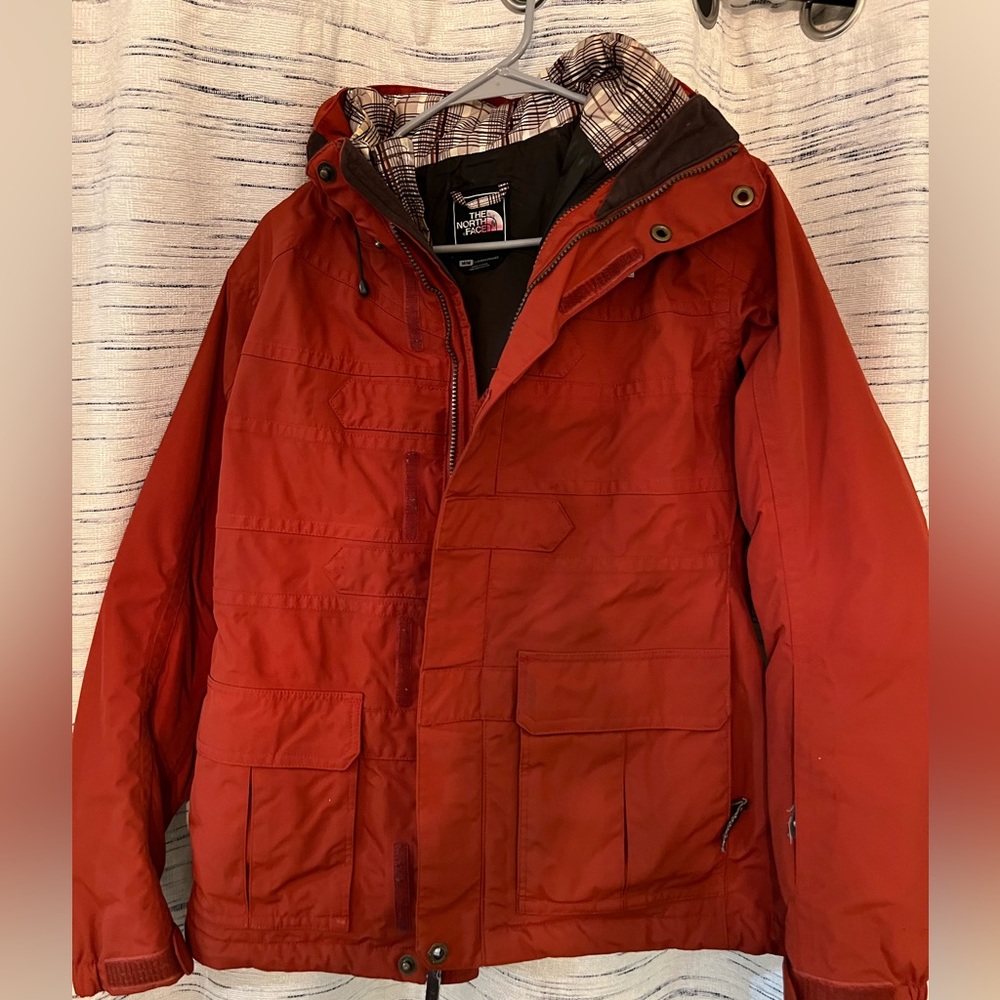 The North Face medium women’s 2 in 1 jacket.